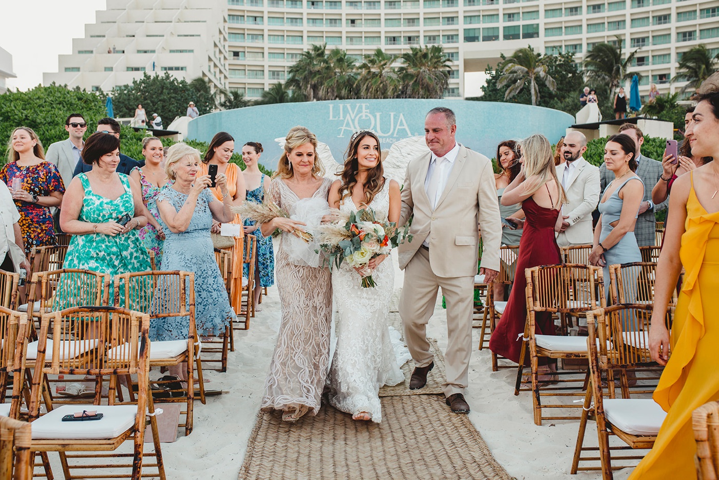 Outdoor wedding ceremony on the beach at Live Aqua Cancún