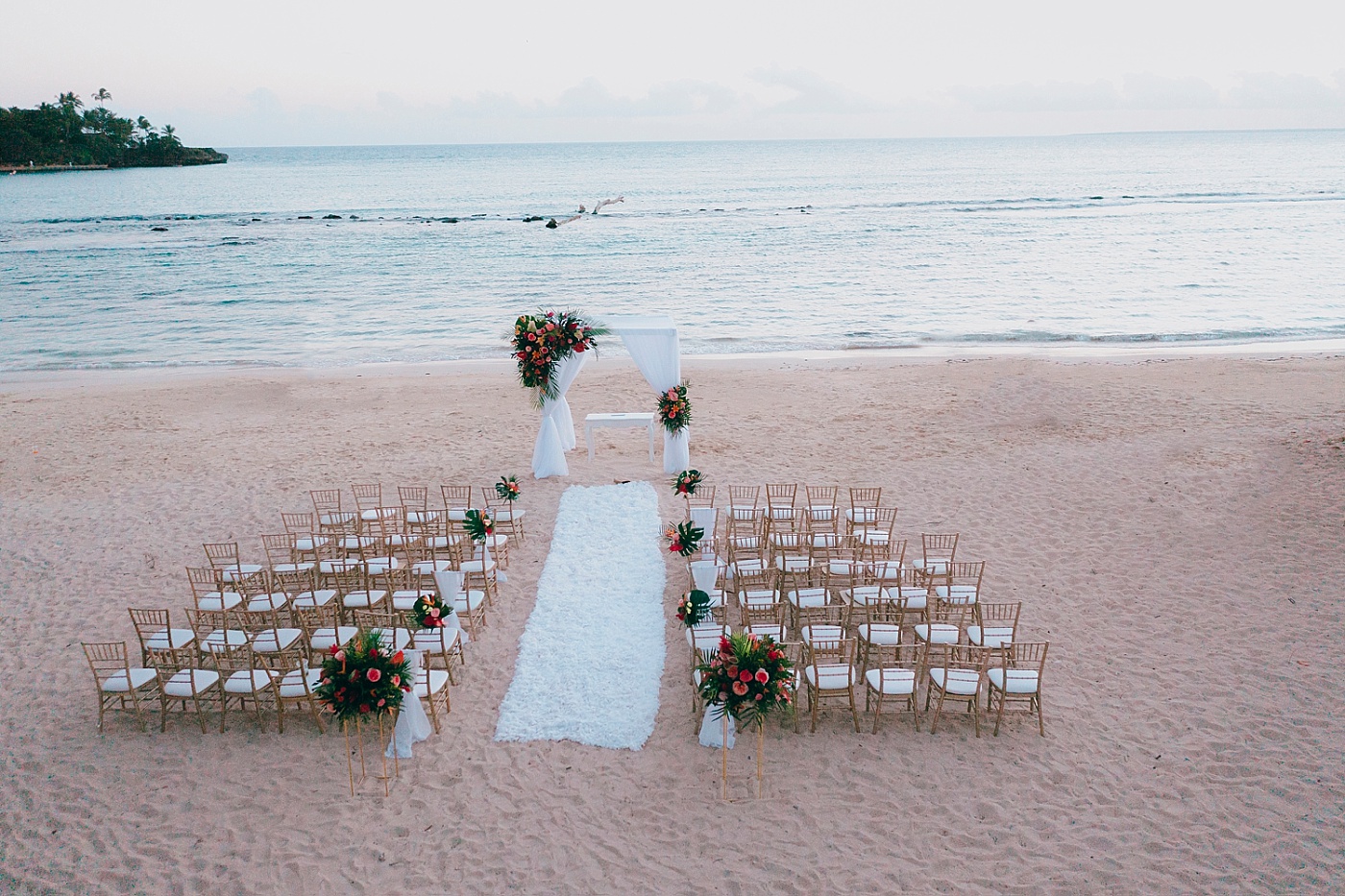 Drone shot of a destination wedding beach ceremony at Casa de Campo