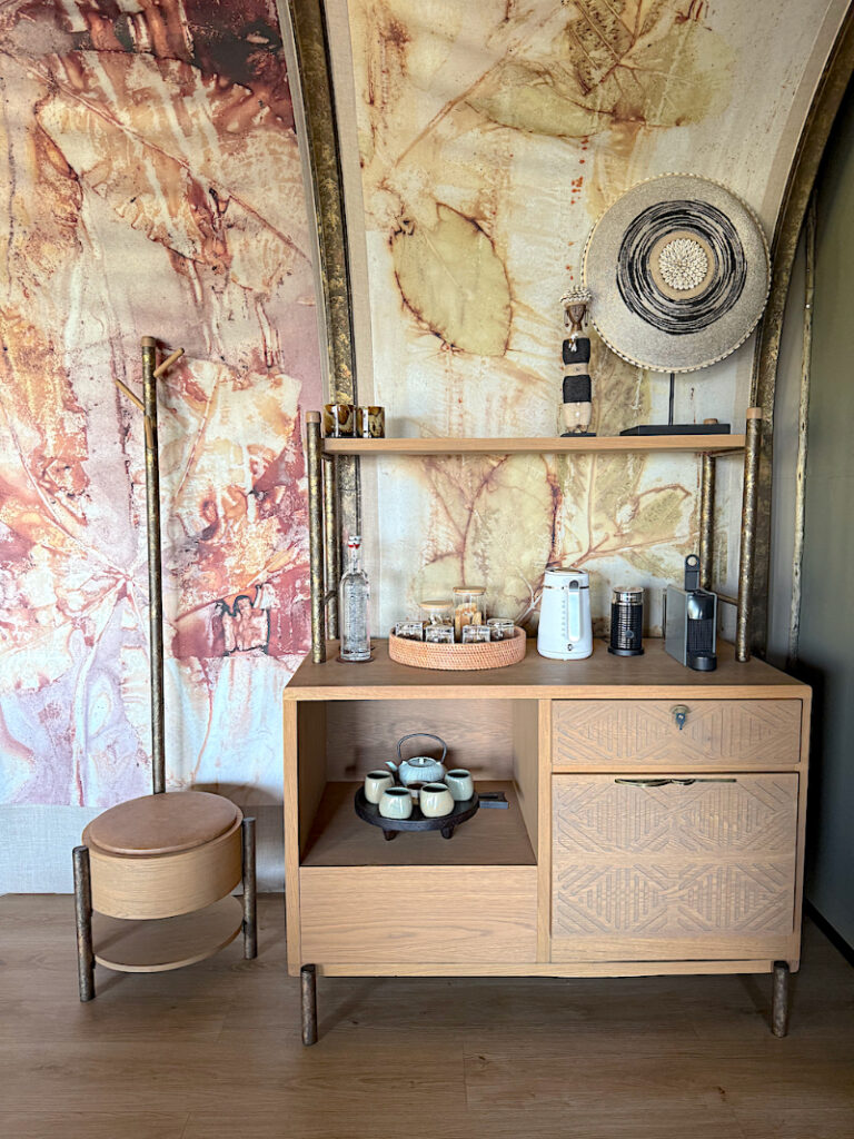 Coffee and tea station inside a luxury safari lodge suite.
